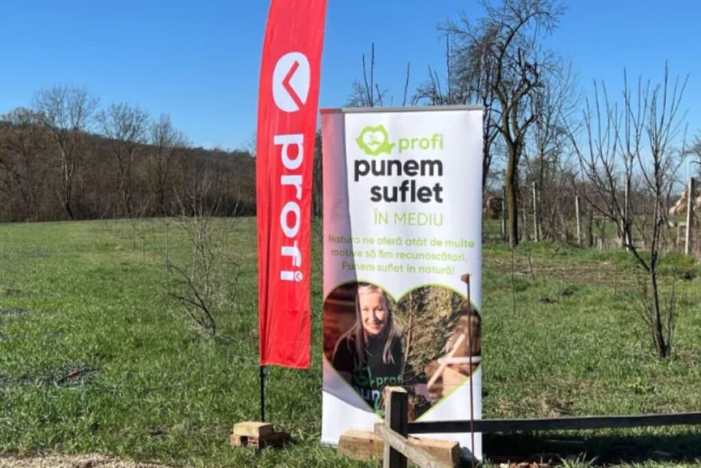 Proiect de mediu sustinut de Profi Romania, cu banner si steag rosu